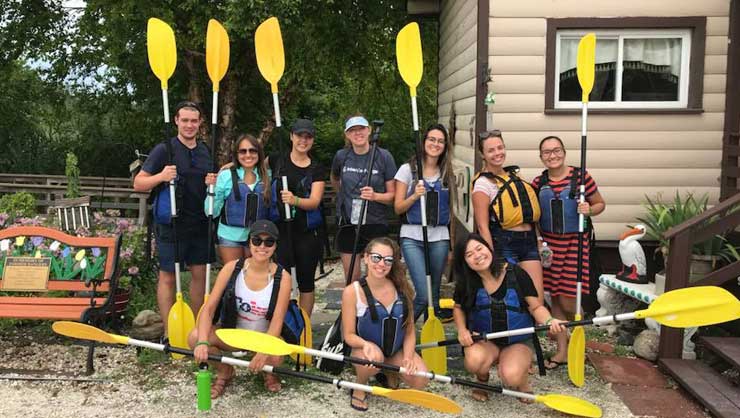 Image courtesy of Ellen Hogan Au pairs in Long Island went kayaking on their local bay.