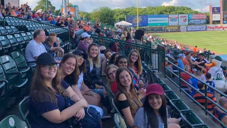 Image courtesy of Jill DeMarco Long Island au pairs went to a baseball game.